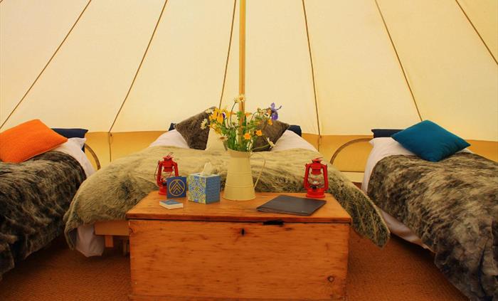 All our tents come with real beds and carpets